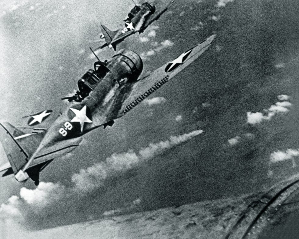 SBDs of VS-8 circle the burning Japanese cruiser Mikuma at Midway, 6 June 1942.