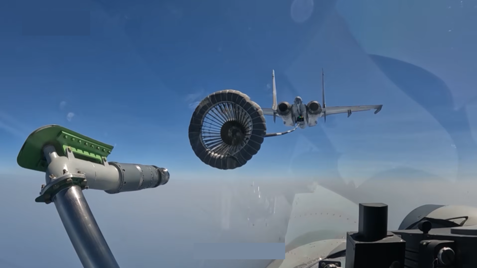 A J-15 tanking in flight buddy aerial refuelling extends the naval Flankers reach.