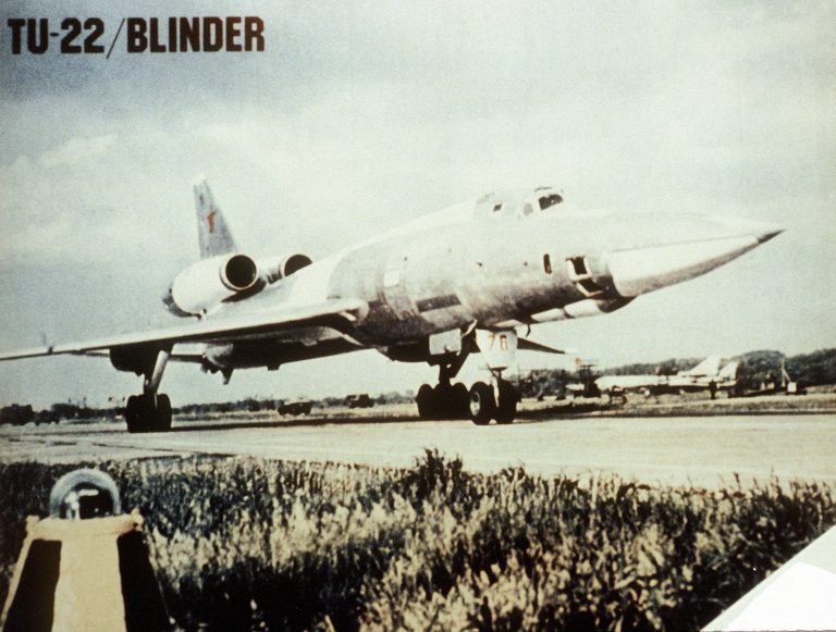 A right-front view of a parked Soviet Tu-22 Blinder  the long nose and tail-mounted engines are clearly visible.