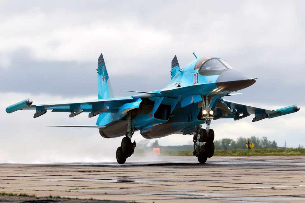 A Su-34 in side profile  the flattened forward fuselage and wide cabin are clear.