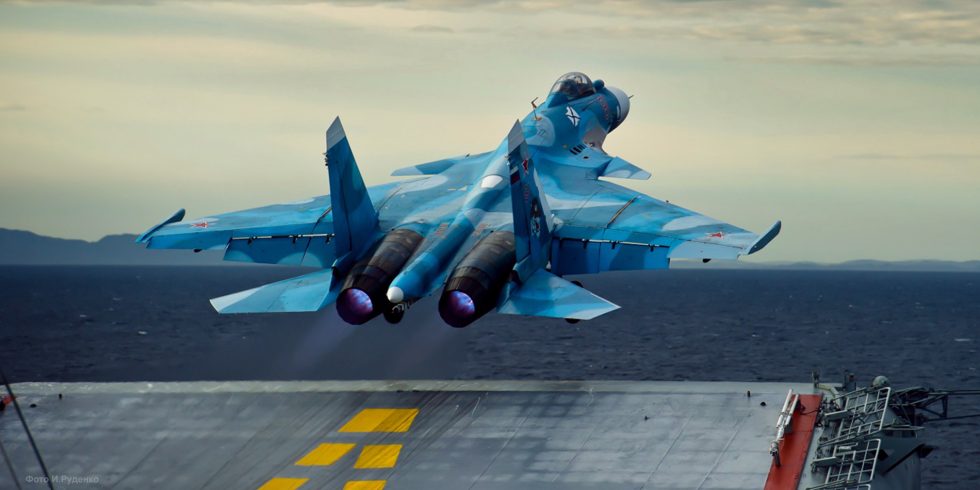 A Su-33 launching off the ski-jump ramp of the carrier Admiral Kuznetsov.
