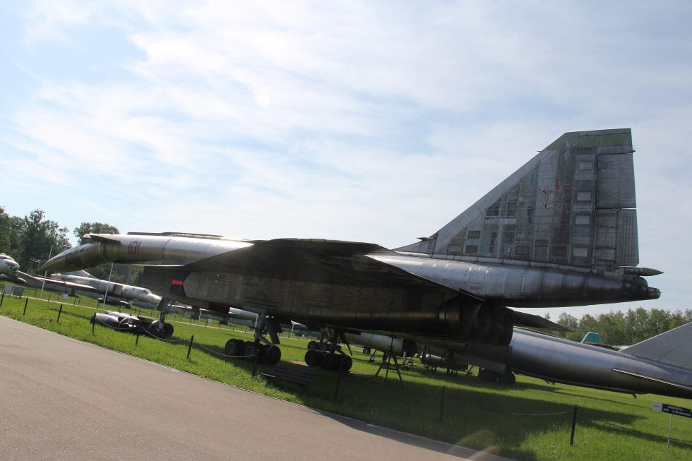 A front three-quarter view showing the long nose and canard foreplanes ahead of the wing.