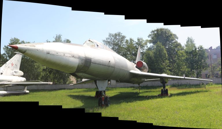 A low front-quarter view of the Monino Tu-22, its engine intakes prominent against the tail fin.