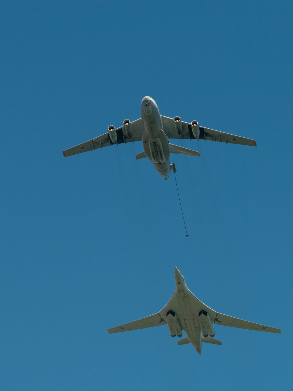 A Tu-160 lines up behind an Il-78 tanker  aerial refuelling extends its intercontinental reach.