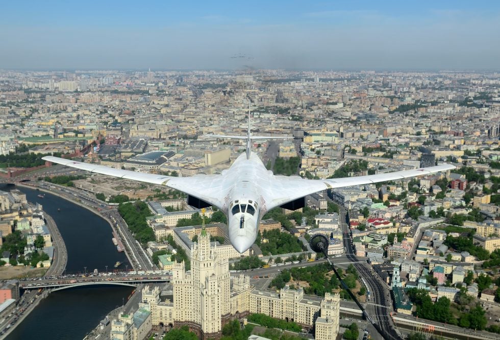 The Tu-160s scale and blended lines are clear from below  wings part-swept.