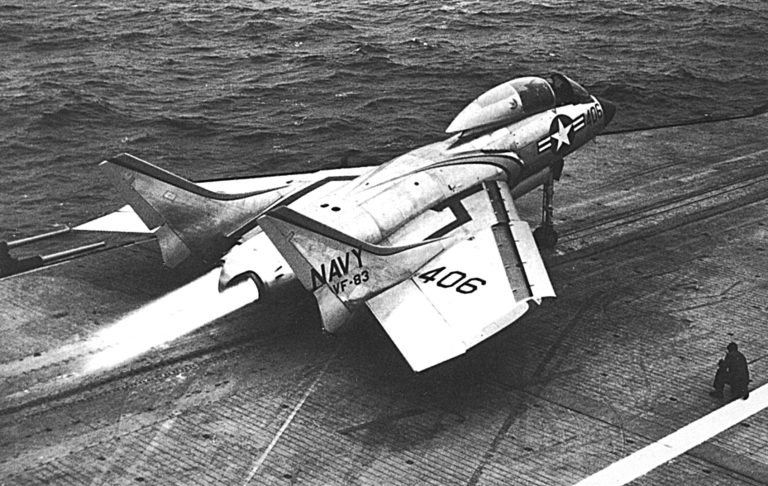 An F7U-3M Cutlass launches from USS Intrepid, 1954 underpowered engines at full thrust.