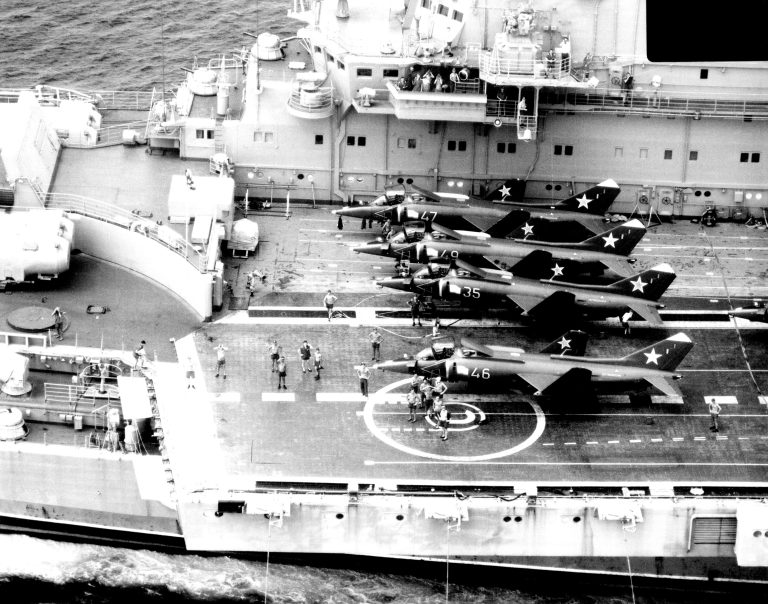 The Kiev-class carrier Minsk underway with four Yak-38s spotted on the flight deck.