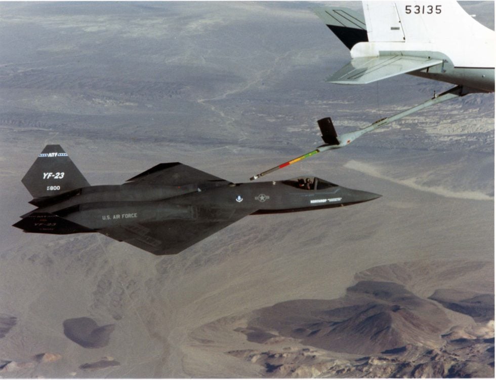 A YF-23 taking on fuel from a tanker during the 199091 flight-test programme refuelling was demonstrated by the fourth flight.