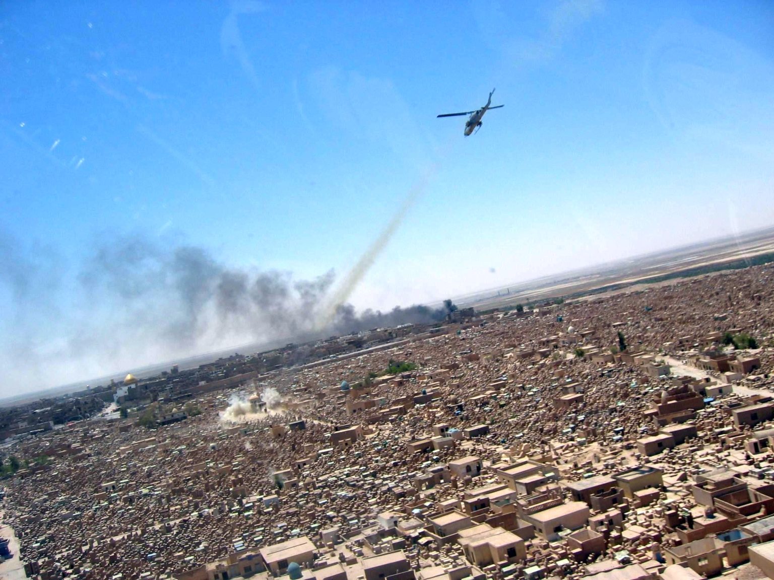 AH-1W SuperCobra attacking a target in Iraq