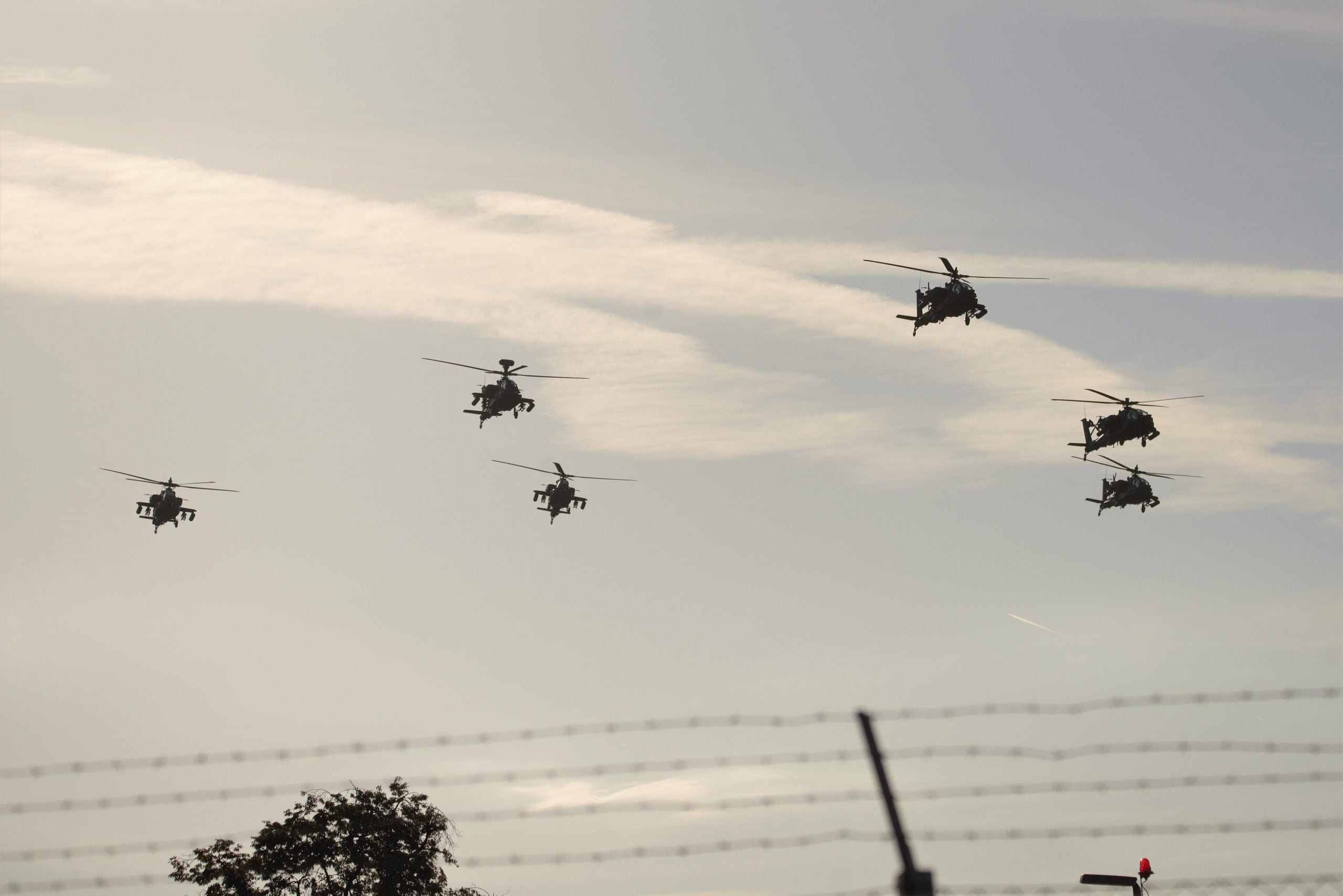 AH-64 Apaches in flight formation