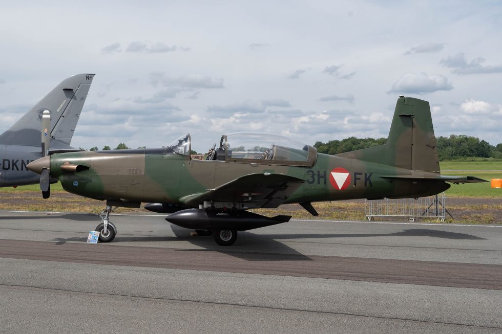 An Austrian Air Force PC-7 in green camouflage  one of more than twenty export operators.
