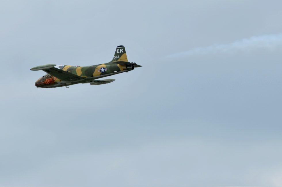 A BAC 167 Strikemaster in flight at an airshow  the trainer-derived light-attack jet in its element.
