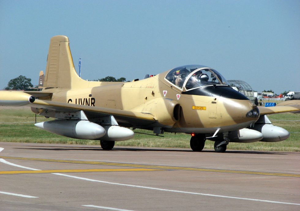 A Strikemaster Mk 87 taxiing  the compact, purposeful shape of a rough-strip attacker.