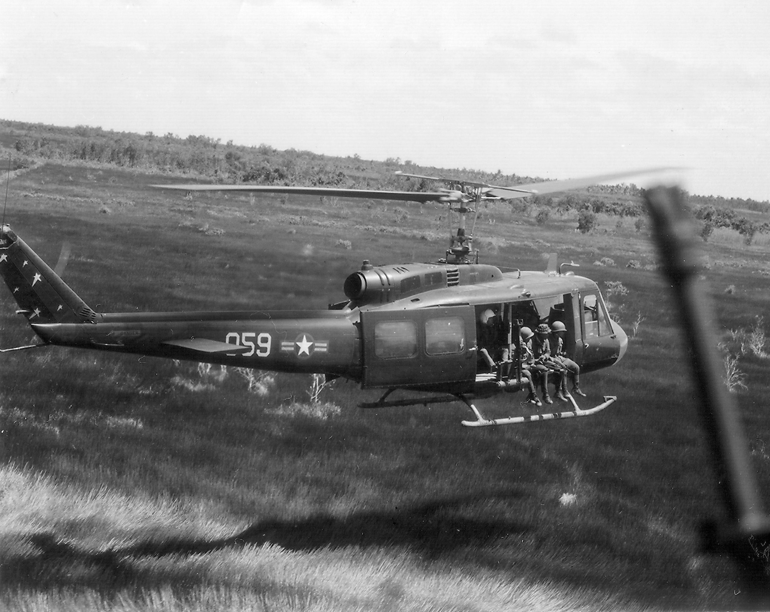 Bell UH-1 Iroquois Huey helicopter in flight during the Vietnam War