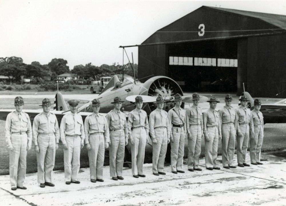 Officers of a U.S. Army pursuit squadron with a Boeing P-26 Peashooter