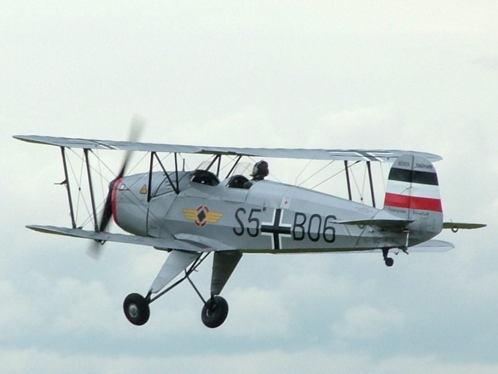 A restored Bücker Bü 131 Jungmann in flight  light, slow and beautifully balanced.