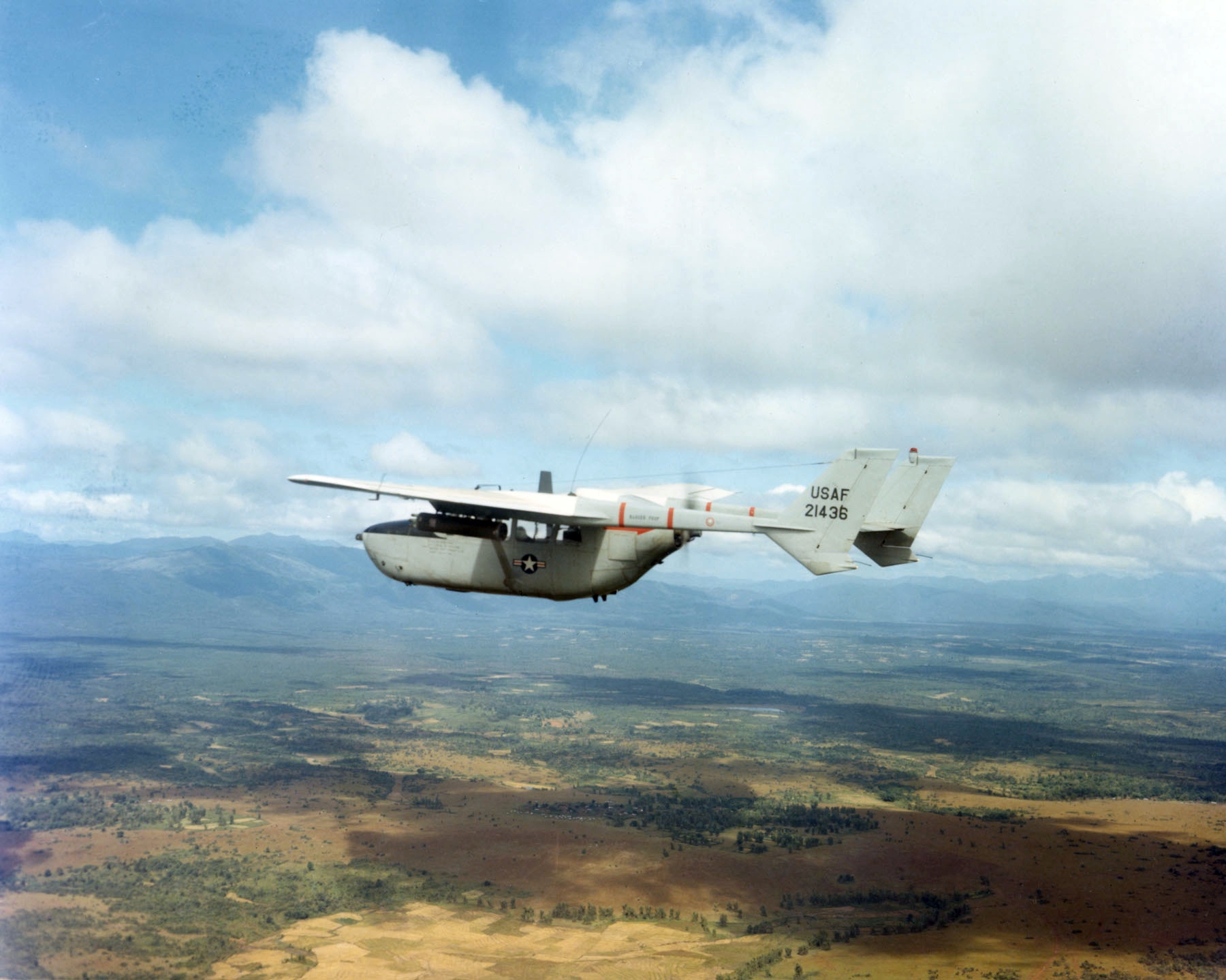U.S. Air Force Cessna O-2A Skymaster forward air control aircraft in flight over Vietnam