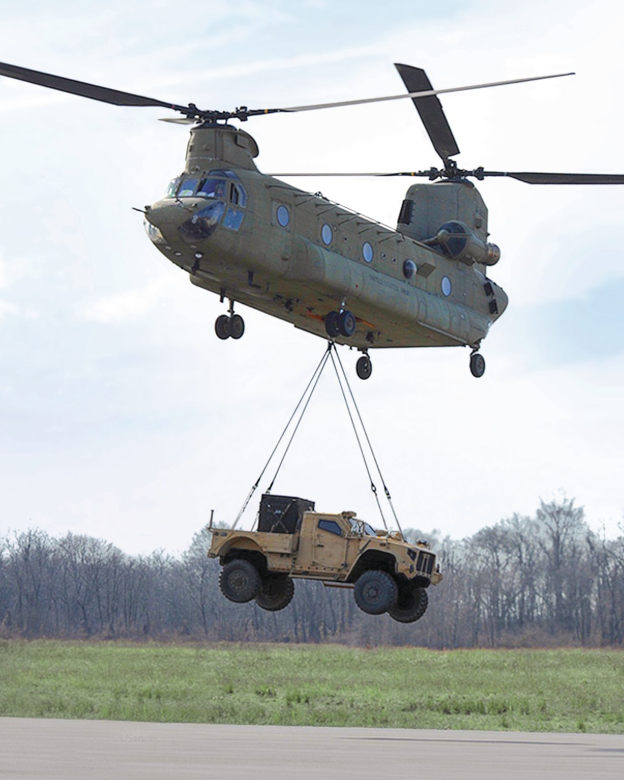 CH-47 Chinook lifting a vehicle as an external sling load