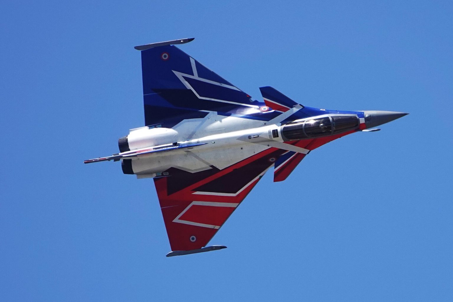 Dassault Rafale solo display fighter banking in flight