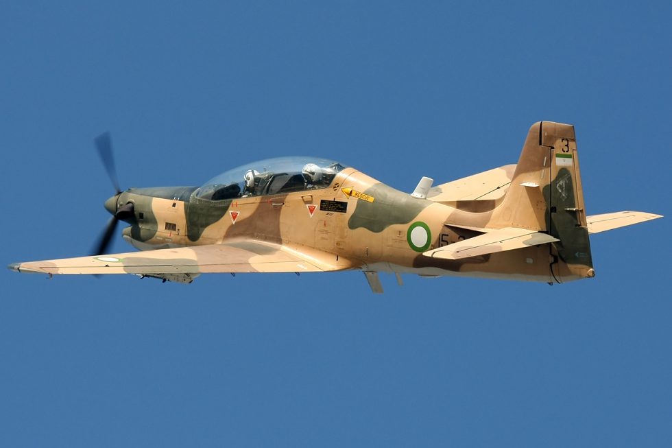 An Embraer EMB-312 Tucano turboprop trainer in flight.