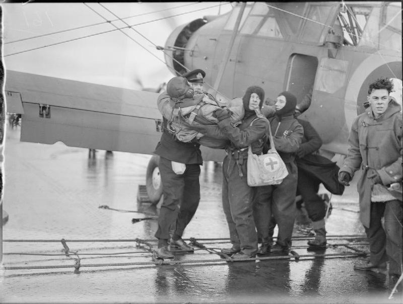 A shadowing Albacore returns to HMS Victorious after operations against Tirpitz; one of the crew was wounded. Photo: Lt C. H. Parnall, RN official photographer &mdash; IWM (public domain).