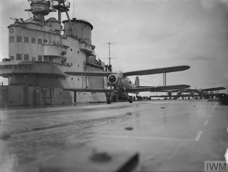An Albacore taking off from HMS Victorious at dawn to attack the German battleship Tirpitz, 9 March 1942. Photo: Lt C. H. Parnall, RN official photographer &mdash; IWM (public domain).