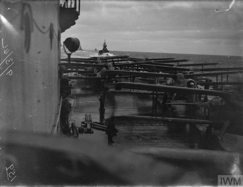 Albacores armed with torpedoes ranged on deck before launching from HMS Victorious against Tirpitz, 9 March 1942. Photo: Lt C. H. Parnall, RN official photographer &mdash; IWM (public domain).