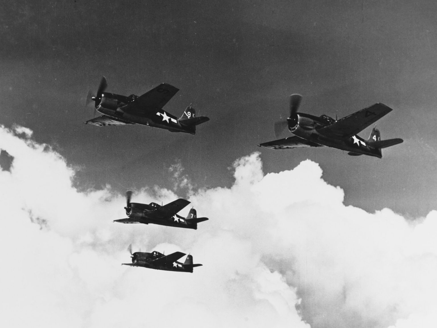 Grumman F6F Hellcat WWII carrier fighters in formation flight