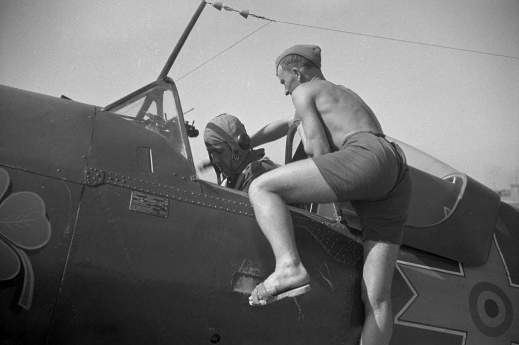 Romanian IAR 80 pilot and mechanic of Grupul 9 preparing for a mission