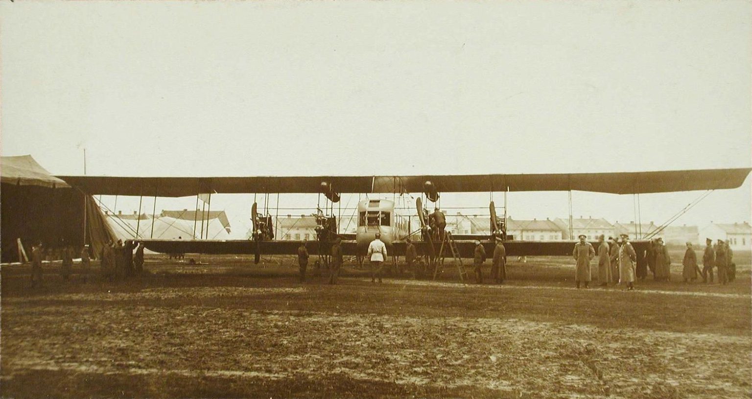 Mechanics at work on the engines — keeping four running was a constant battle.
