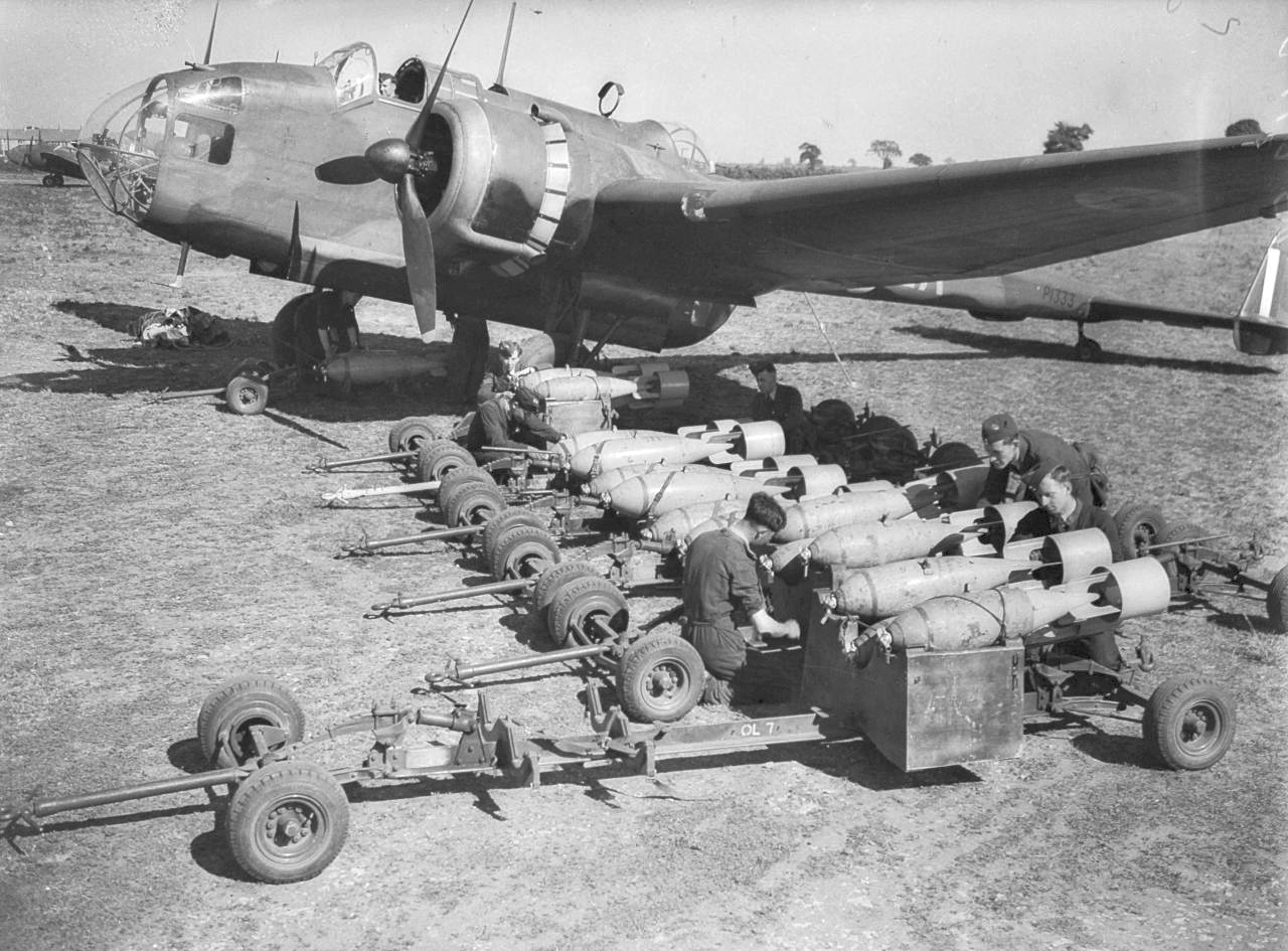 Ground crew loading bombs onto a Handley Page Hampden