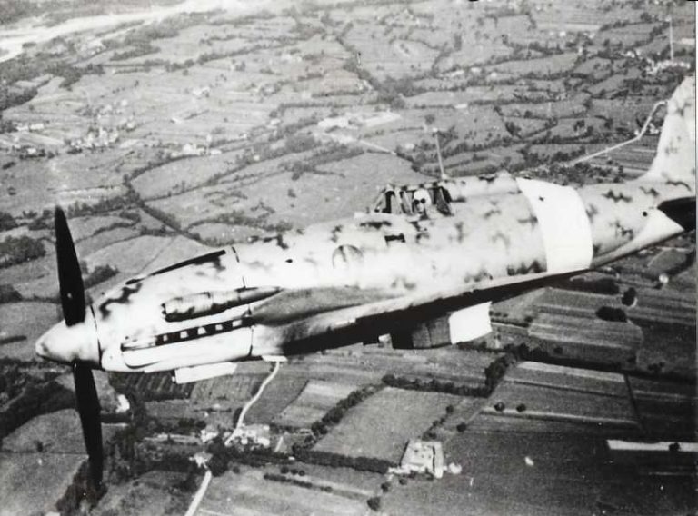 A Macchi C.202 Folgore at a forward desert airstrip