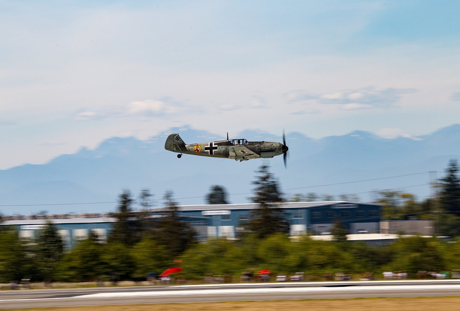 Messerschmitt Bf 109 WWII fighter flying low on approach