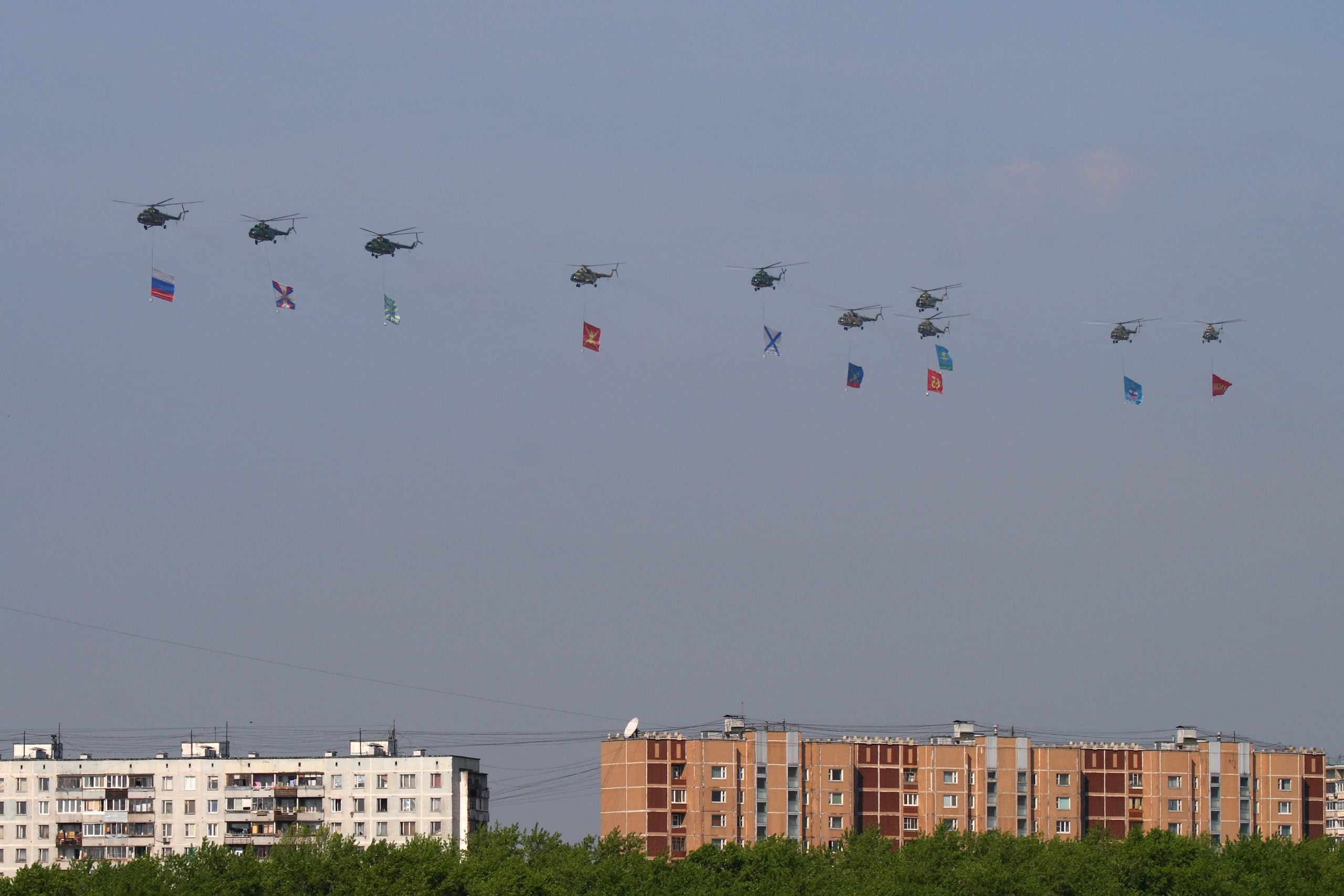 Russian Mil Mi-8 Hip transport helicopters flying in formation over Moscow