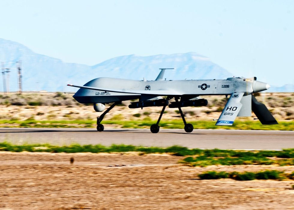 An MQ-1B Predator on the ramp, sensor ball under the nose.
