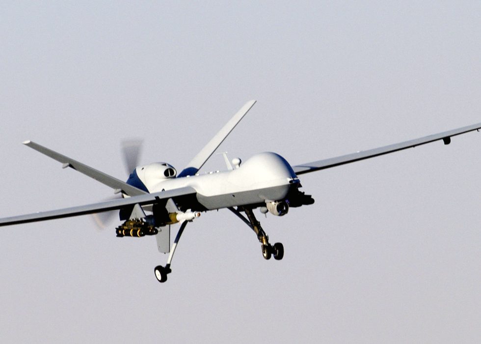 An MQ-9 Reaper in flight, returning from a mission note the long, high-aspect wing built for endurance.