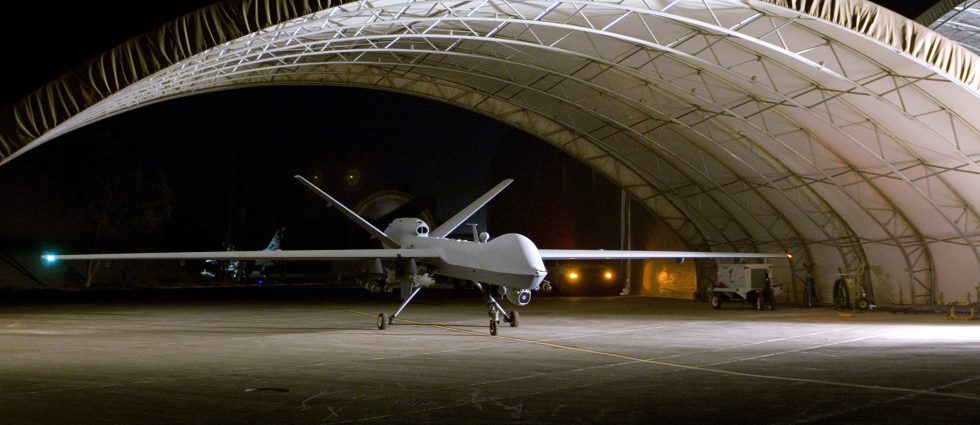 A remotely piloted MQ-9 taxis from its hangar at Joint Base Balad, Iraq.