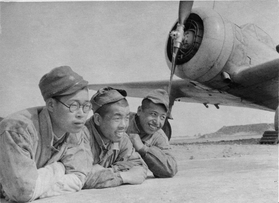 A Ki-27 with its ground crew  a simple, rugged fighter built to work from rough strips.