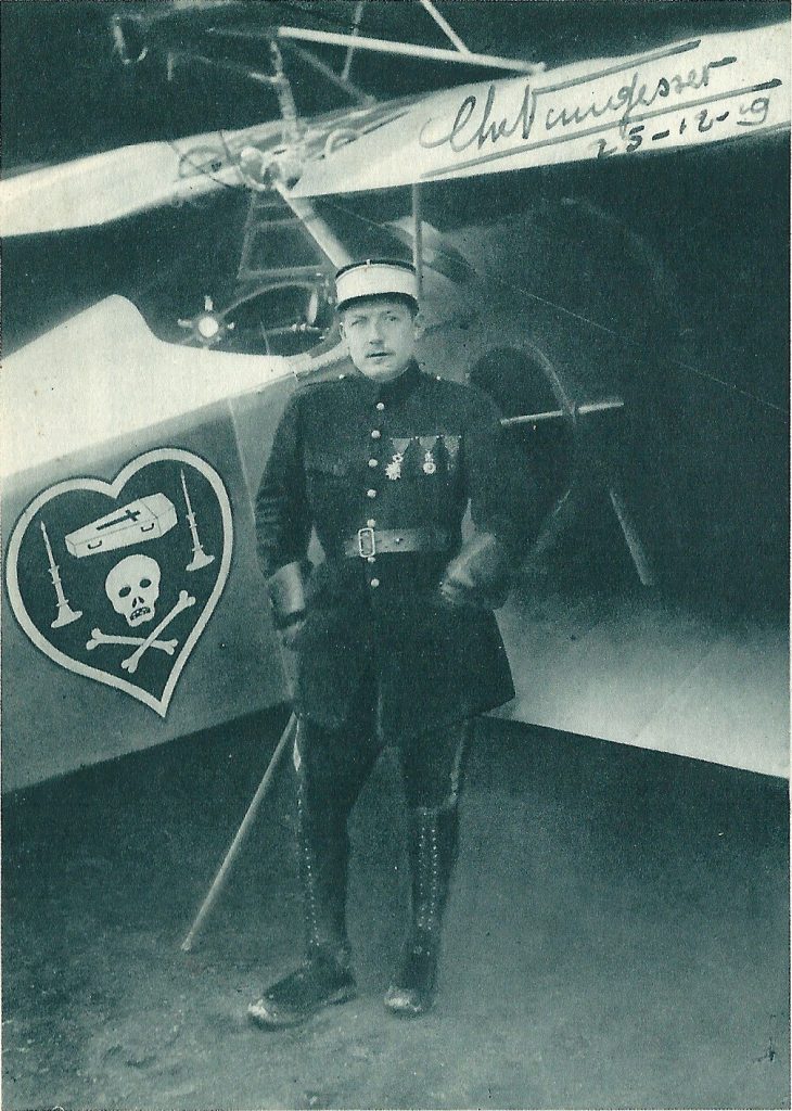 French ace Charles Nungesser beside a Nieuport with his skull-and-coffin emblem