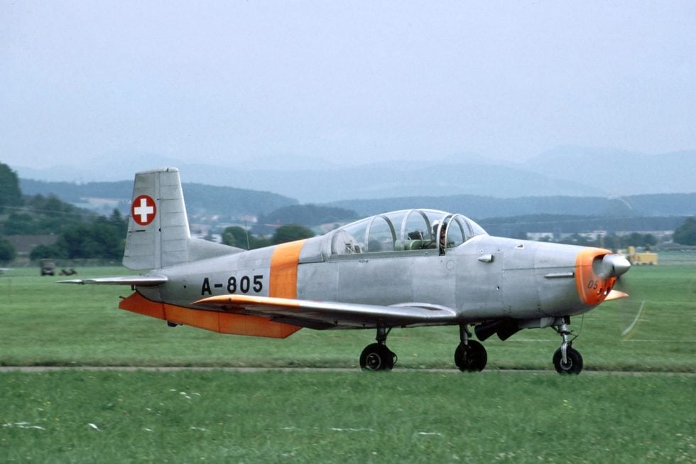 A Pilatus P-3 wearing classic Swiss Air Force markings on the ground.