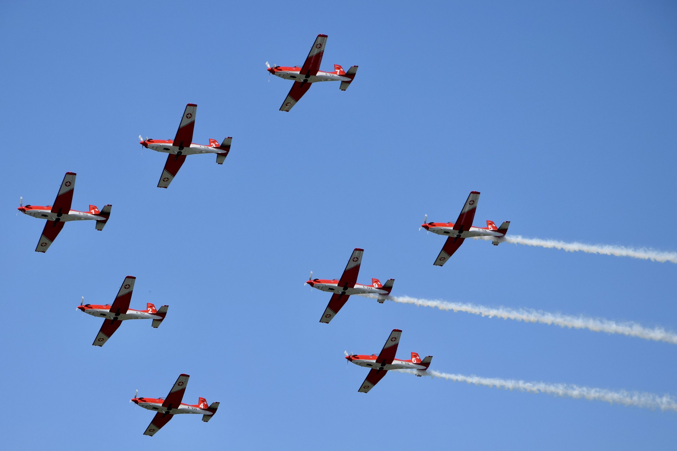 Swiss Air Force PC-7 TEAM flying the Pilatus PC-7 Turbo Trainer in formation