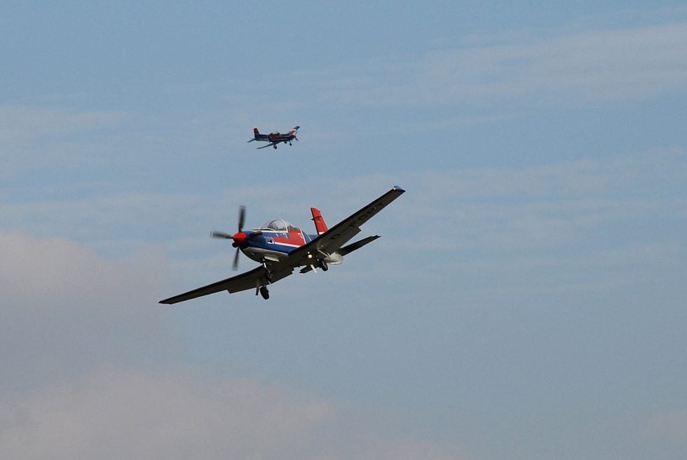 A Pilatus PC-9 in flight a turboprop advanced trainer built to fly like a jet.