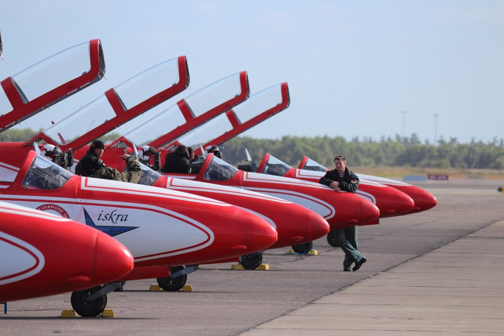 White-and-Red Sparks Iskras performing abroad at a Danish air show.