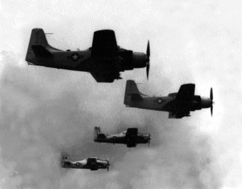VNAF T-28D Trojans and Douglas A-1E Skyraiders in formation over Vietnam, 1964.