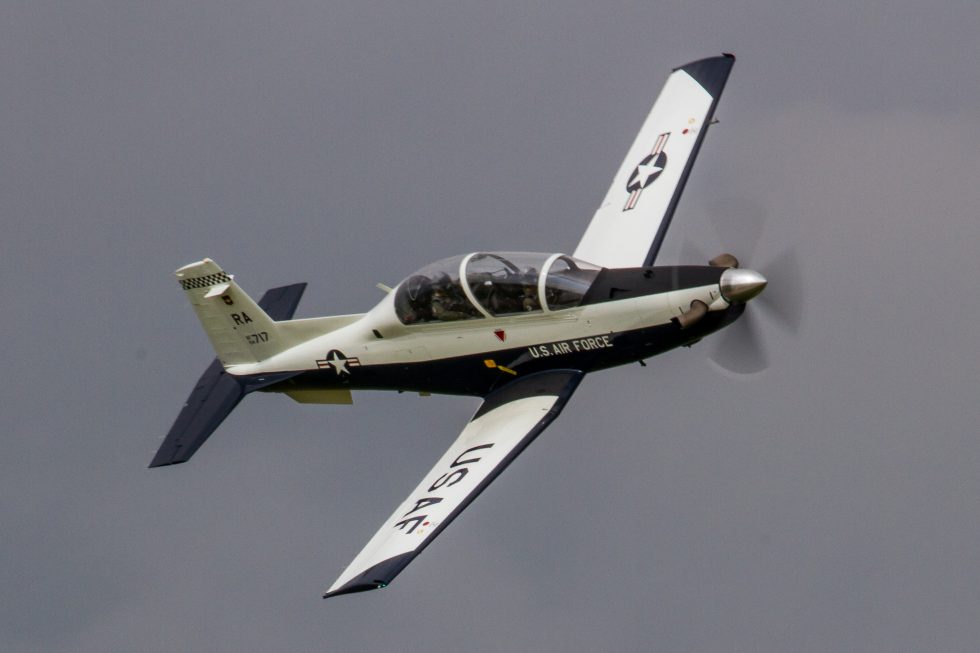 A T-6 Texan II performing a flying display  the turboprop that trains new military pilots.