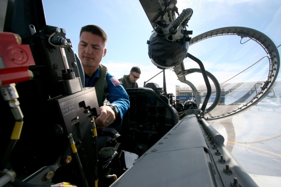 The tandem cockpit of a T-6 Texan II, where student and instructor sit in line.